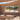 Voile d'ombrage naturelle en fibre de coco style Ibiza au-dessus d'une terrasse méditerranéenne – Coco Shade
Gros plan sur le tissage ouvert de la voile d'ombrage en fibre de coco, maille 1 cm
Voile d'ombrage triangulaire en coco tendue sur la plage, style bohème
Cosse inox à l'angle d'une voile d'ombrage naturelle en fibre de coco