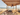 Natural coconut fibre shade sail in Ibiza style above a Mediterranean terrace – Coco Shade
Close-up of the open weave of the coconut fibre shade sail with 1 cm mesh
Triangular coconut fibre shade sail tensioned on the beach, boho style
Stainless steel thimble in the corner of a natural coconut fibre shade sail