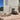 Round Umbrosa Versa PX in Canvas, tilted canopy over a modern villa terrace